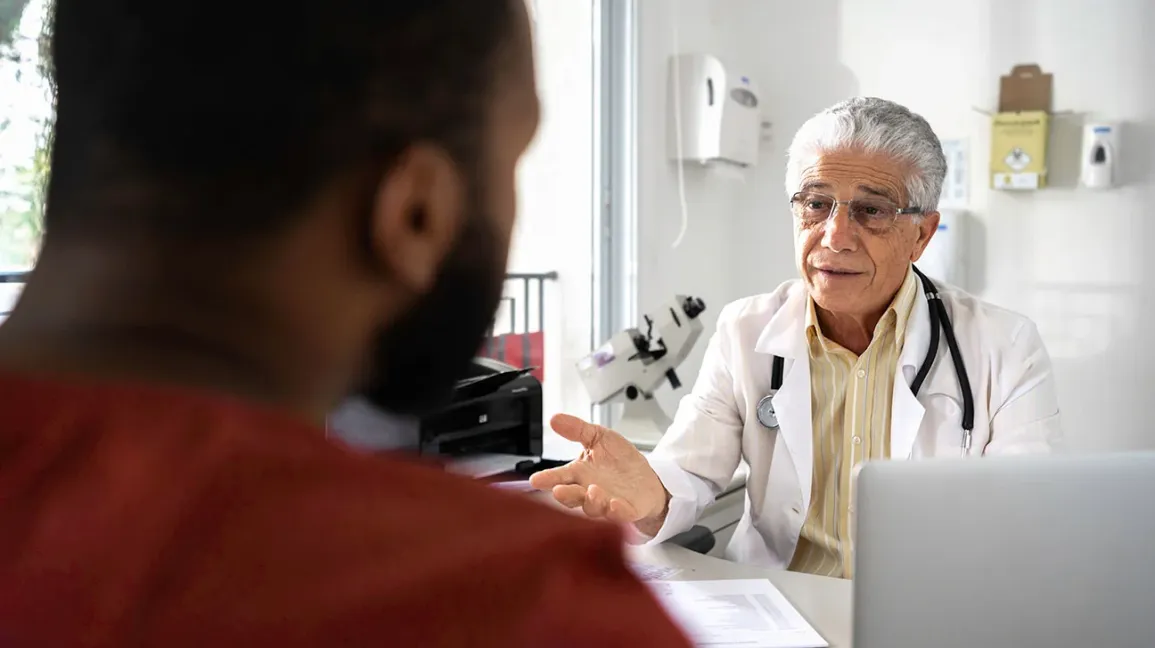 male patient doctor talking at desk 1296 728 header ED Treatment Options In Media, Pennsylvania with Gameday Media