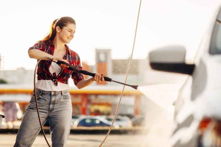 woman using the best pressure washer for your car Affordable Pressure Washer Options: Car Pressure Washers and Other Non-Electric Washers