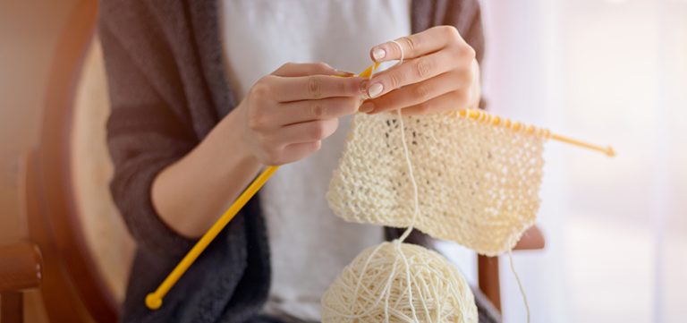 benefits of knitting GettyImages 509665506 feature The Emotional and Practical Benefits of Knitting for Children