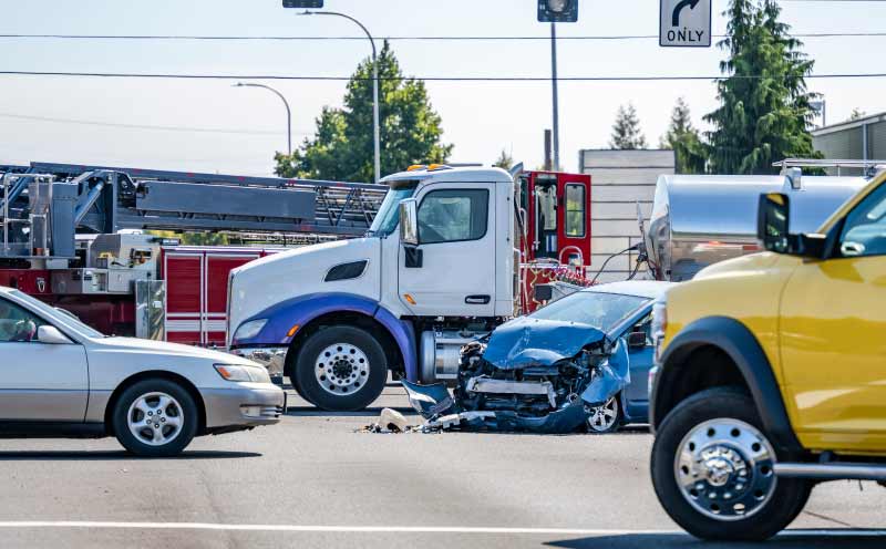 Big Trucks, Big Insurance—But Still a Fight for Victims 1 Crash with car and big rig semi truck Big Trucks, Big Insurance—But Still a Fight for Victims